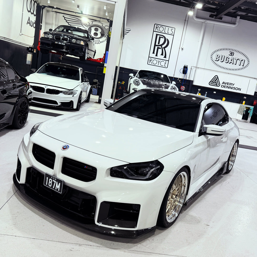 Performance V1 Carbon Fiber Side Skirt Extensions - G87 M2