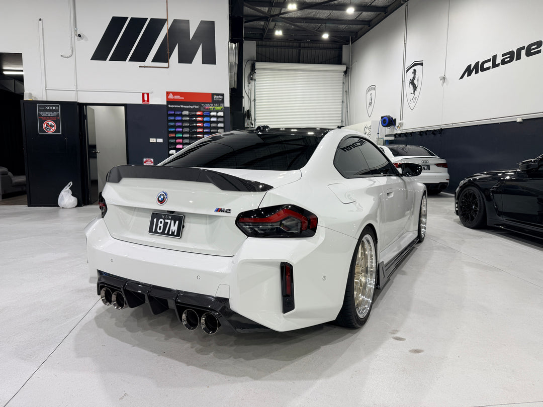 Performance V1 Carbon Fiber Side Skirt Extensions - G87 M2